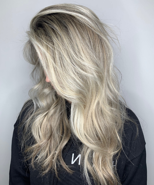 Blonde Hair Down Styled with Waves 